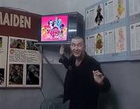 11489
